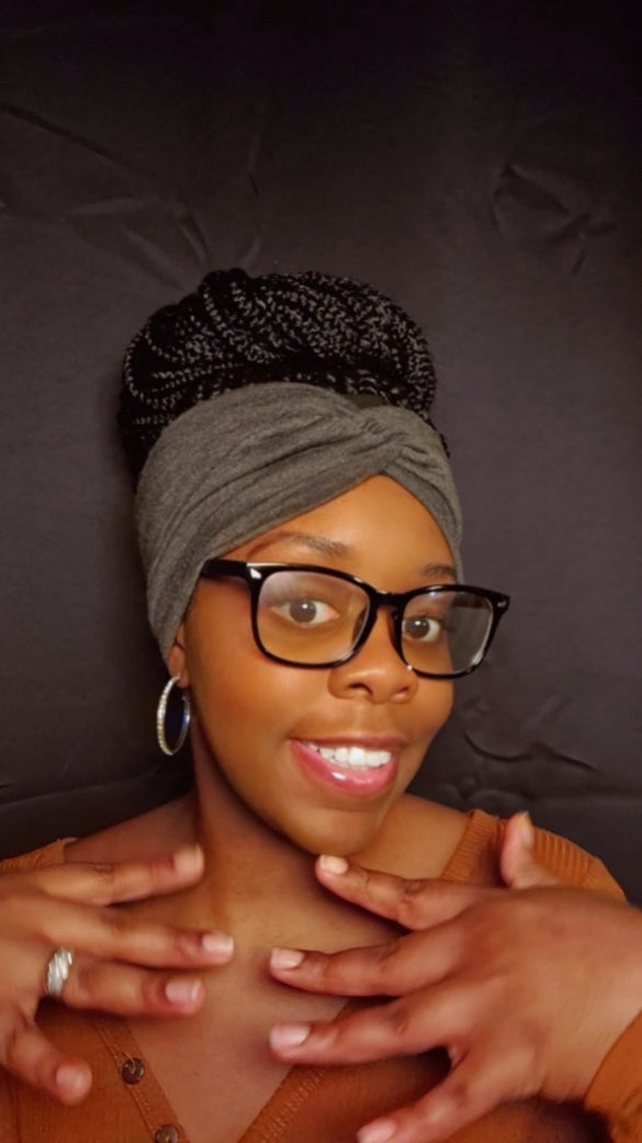 Load video: Braided headband wig by NishaBlessedHands LLC, featuring a stylish ready-to-wear braided bun design